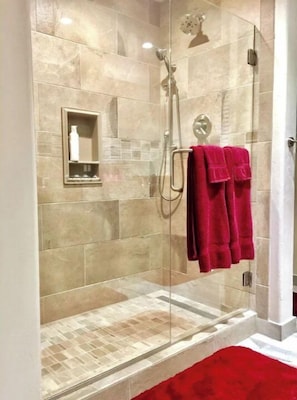 Shower, hair dryer, towels, soap