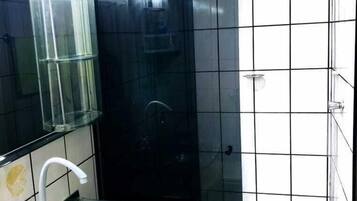 Family Quadruple Room | Bathroom | Shower, designer toiletries, towels, soap