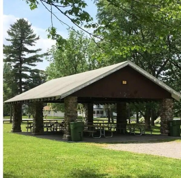 Situated in a serene park-like setting, this pavilion offers a peaceful retreat.