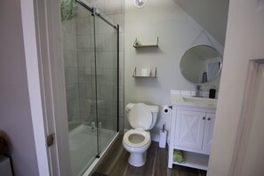 Shower, towels, soap, shampoo