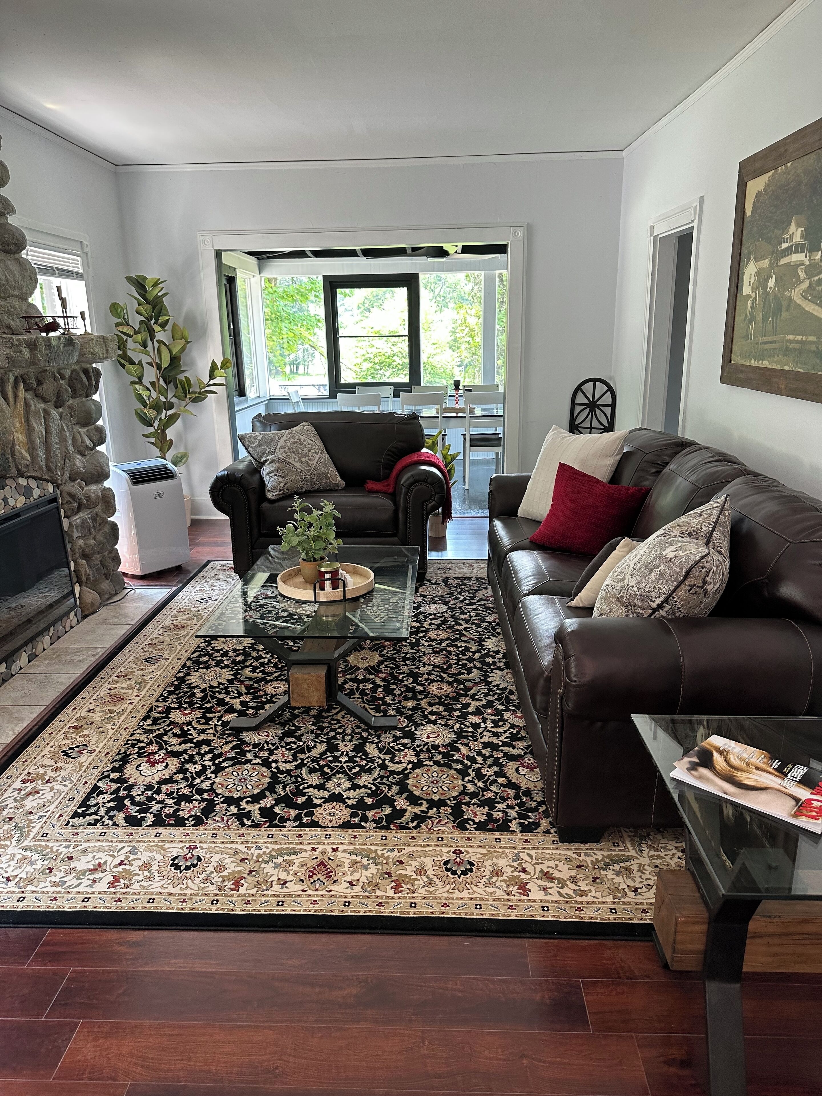 Smart TV, fireplace, books, computer monitors