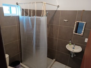 Ducha, toallas y jabón