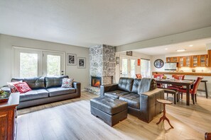 TV, fireplace, books