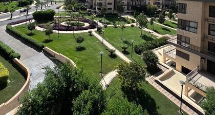 Elegant hotel apartment in madinaty garden view