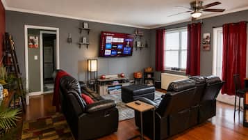 Deluxe Condo, Multiple Beds, Kitchen, City View | Television