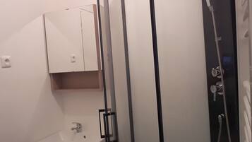 Shower, hair dryer, toilet paper
