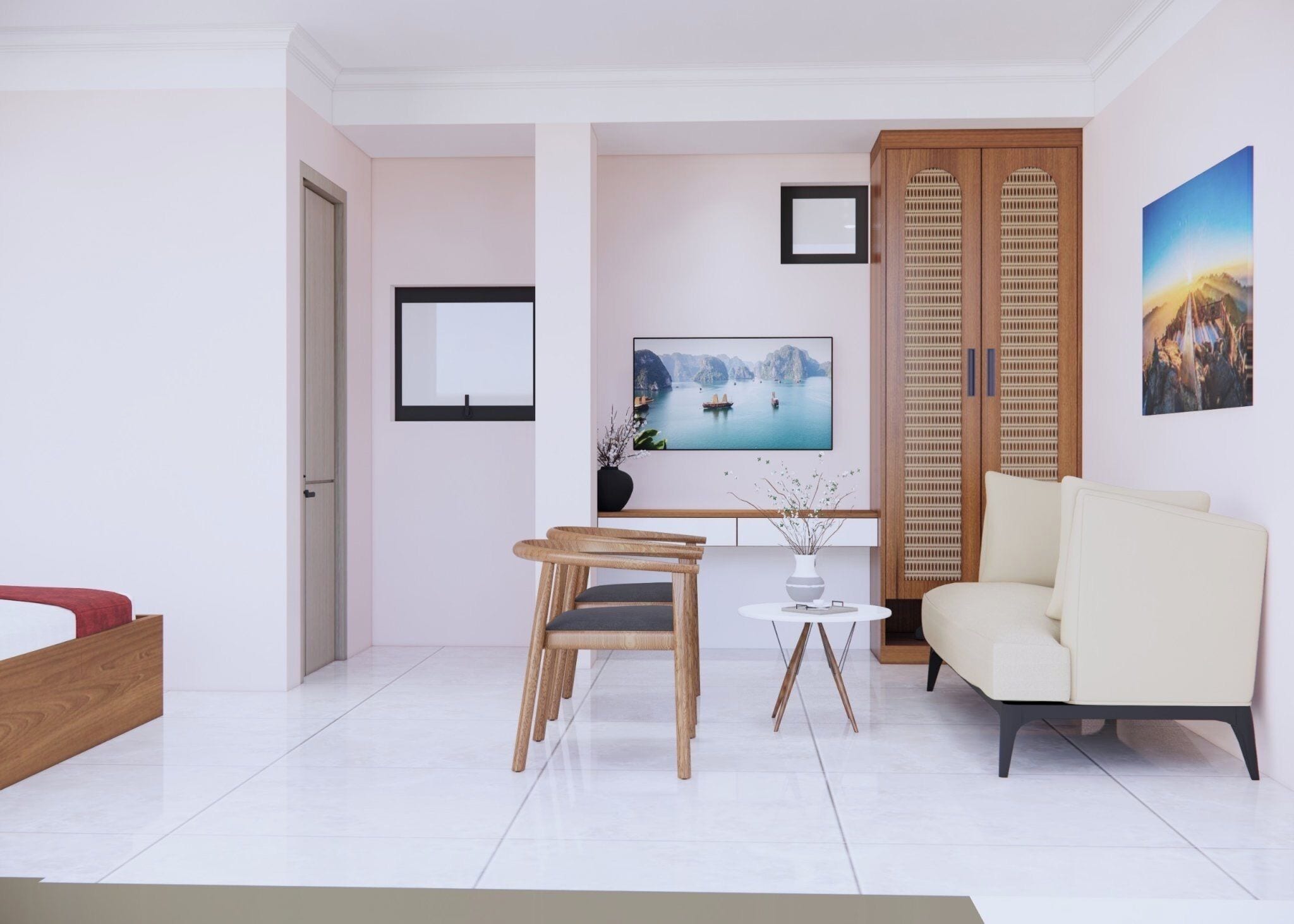 A modern living room with a sofa, a dining table, and a TV mounted on the wall.