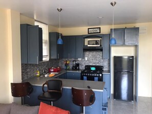 Fridge, microwave, oven, stovetop - Palmvillo of Thibaud, five minutes walk to the beach (Thibaud)