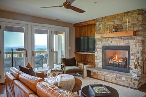 Smart TV, fireplace, books