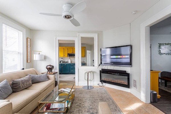 Flat-screen TV with the option to use your streaming accounts.