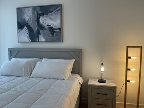 1 bedroom, desk, iron/ironing board, travel crib