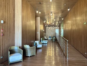 Relax in our spacious lobby with comfortable seating areas and a clean, minimalist design.