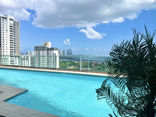 Enjoy a refreshing swim with a city view.