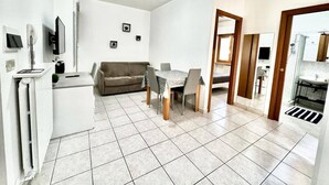 Apartment, 1 Bedroom, Balcony, City View | Dining - Nobil Villani - Two-room Apartment on the Ground Floor (Tortoreto)