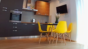 House, 1 Bedroom, Balcony, Garden View | Dining room - Kemilia Apartments Matera Tourist Rental (Matera)