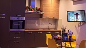 House, 1 Bedroom, Balcony, Garden View | Dining - Kemilia Apartments Matera Tourist Rental (Matera)