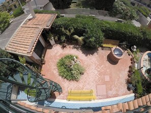 Apartamento, 2 habitaciones, fumadores, patio | Jardines del alojamiento