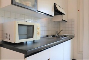 Apartamento, 1 quarto, sacada, vista para a cidade | Parte interna