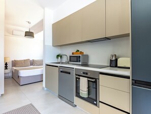 Studio, Multiple Bedrooms, Balcony, City View | Living room