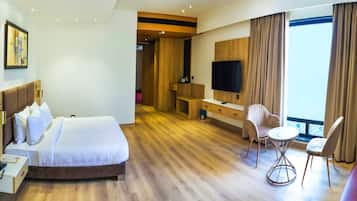 Deluxe Double Room | Minibar, desk, laptop workspace, iron/ironing board