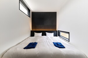 Suite, vistas al mar | Edredones de plumas, caja fuerte, cortinas opacas y wifi gratis