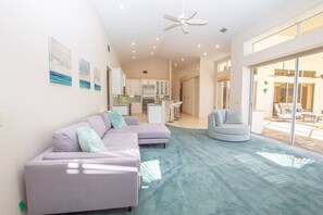 Smart TV, fireplace, books, offices - Luxury Retreat 4 BR Mediterranean Home w/ Heated Pool | Steam Room | Golf Views | Spacious Lanai (Zephyrhills)