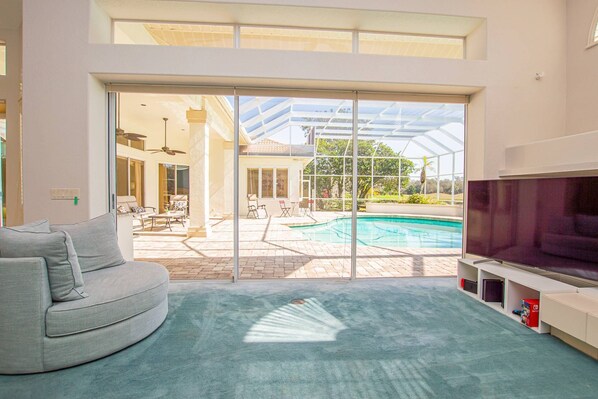 A heated pool - Luxury Retreat 4 BR Mediterranean Home w/ Heated Pool | Steam Room | Golf Views | Spacious Lanai (Zephyrhills)