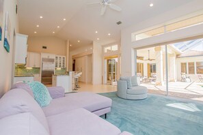 Smart TV, fireplace, books, offices - Luxury Retreat 4 BR Mediterranean Home w/ Heated Pool | Steam Room | Golf Views | Spacious Lanai (Zephyrhills)