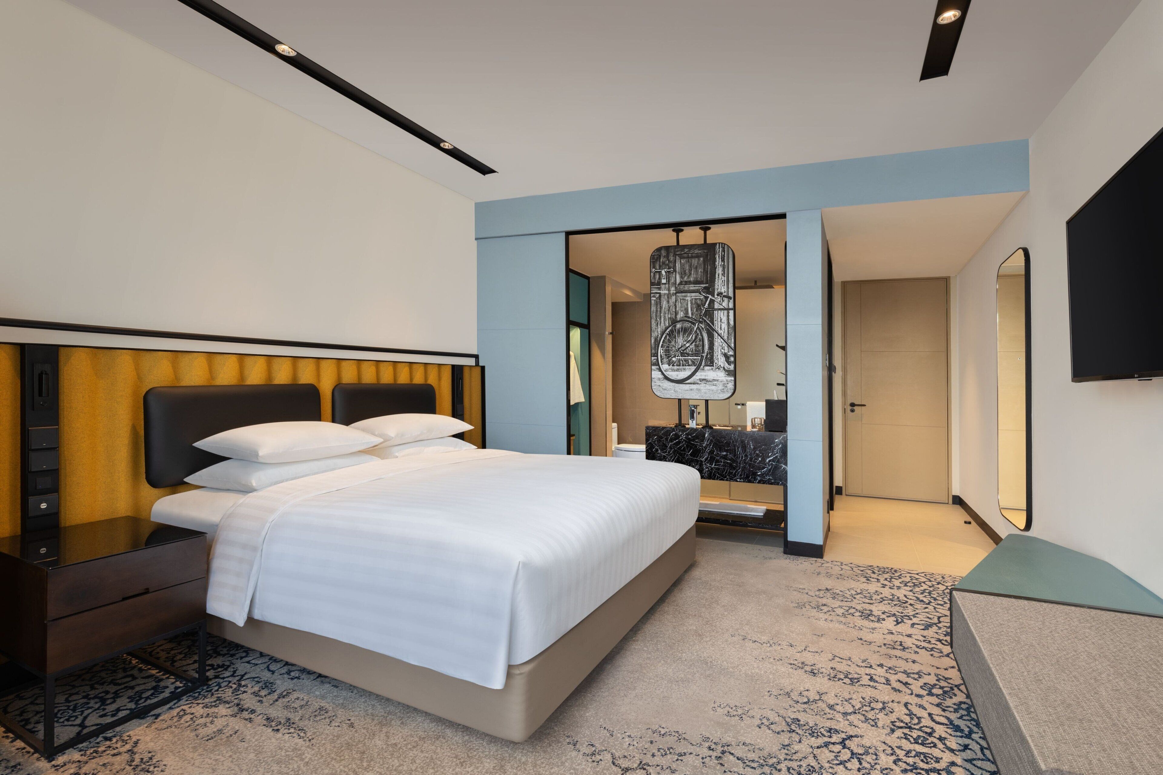 Premium bedding, down comforters, memory foam beds, minibar