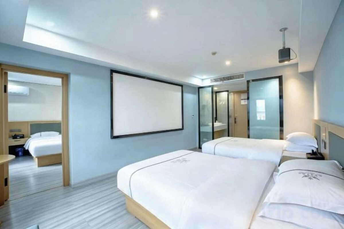 Deluxe Triple Suite (Two Spacious Rooms + Large Screen Projection)