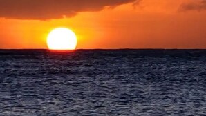 A sunset over the ocean. - Seagull Suite G - Beach Front Living (Laborie Beach)