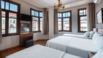 Family Triple Room | Egyptian cotton sheets, premium bedding, laptop workspace, free WiFi