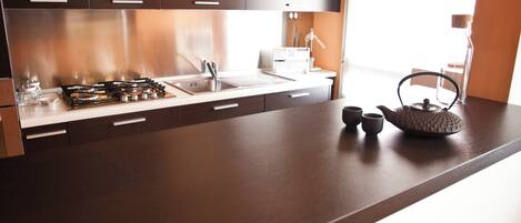 Apartment (1 Bedroom) | Private kitchen | Microwave, oven, stovetop, dishwasher