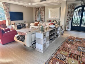 Smart TV, DVD player, books, video library