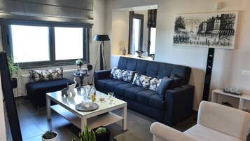 Family House, Multiple Beds, 2 Bathrooms (Despina House Sea View Mirabello) | Living area | Flat-screen TV, fireplace, DVD player