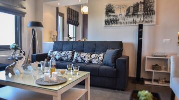 Family House, Multiple Beds, 2 Bathrooms (Despina House Sea View Mirabello) | Living area | Flat-screen TV, fireplace, DVD player