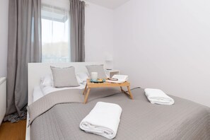 1 bedroom, desk, iron/ironing board, bed sheets