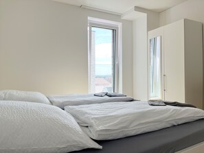 Superior Apartment, 3 Bedrooms, Balcony | Desk, laptop workspace, blackout drapes, free WiFi