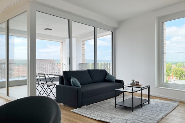 Deluxe Apartment, 3 Bedrooms | Living area | 43-inch flat-screen TV with digital channels, TV