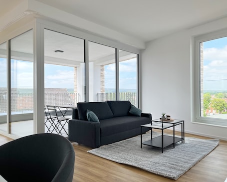 Superior Apartment, 3 Bedrooms, Balcony | Living area | 43-inch flat-screen TV with digital channels, TV