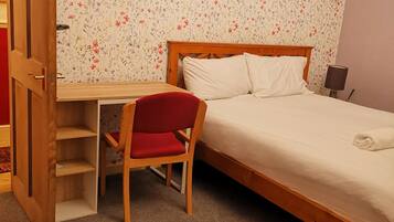 Deluxe Room, 1 King Bed | Individually furnished, desk, laptop workspace, free WiFi