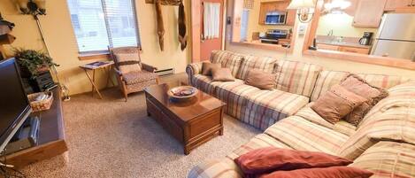 Televisio, takka, työhuone