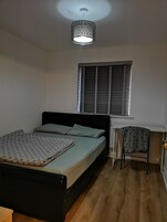 Deluxe Room, 1 King Bed, Garden View | Individually furnished, desk, laptop workspace, blackout drapes