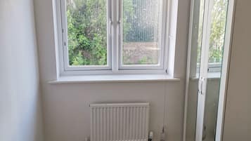 Deluxe Room, 1 King Bed, Garden View | Individually furnished, desk, laptop workspace, blackout drapes