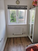 Deluxe Room, 1 King Bed, Garden View | Individually furnished, desk, laptop workspace, blackout drapes