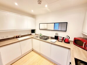 Apartemen, 2 Tempat Tidur Queen | Dapur pribadi | Lemari es, microwave, oven, dan kompor