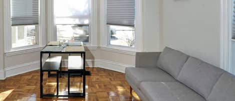 Smart TV, fireplace, books, offices