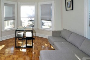 Smart TV, fireplace, books, offices