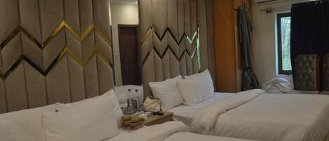 Deluxe Twin kamer | Geluiddichte muren, beddengoed