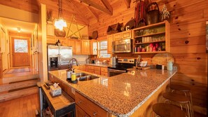 Fridge, microwave, oven, stovetop - Cabin on the Rocks- Log Home (Hendersonville)